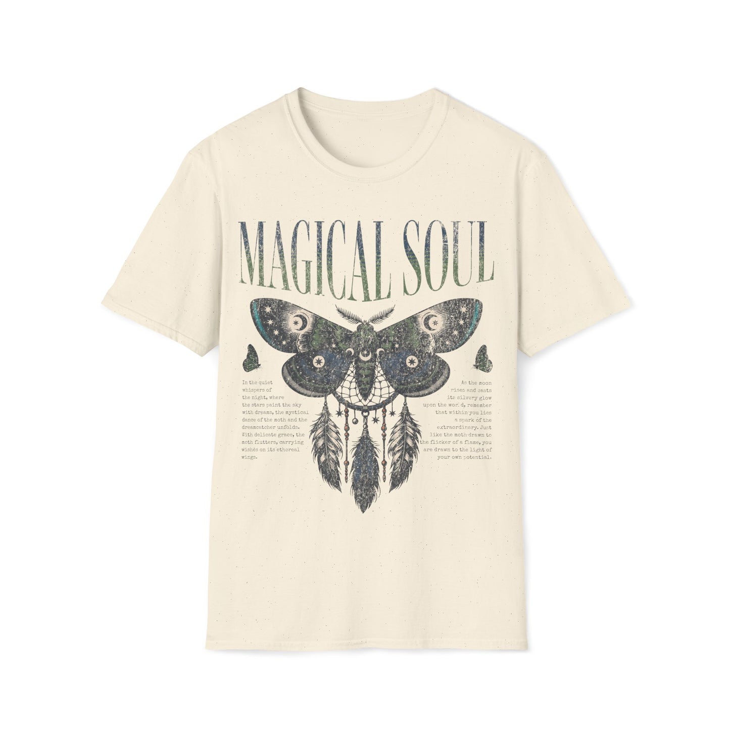 A flat-lay photograph of a natural colored t-shirt featuring a detailed, mystical graphic design. The artwork displays a large moth integrated with a dreamcatcher, adorned with celestial symbols like stars and moons. Below the moth is a printed poem